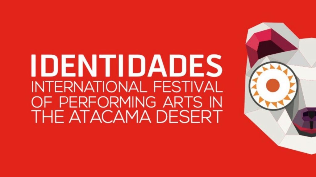 Red background with "IDENTIDADES International Festival of Performing Arts in the Atacama Desert" written beside a bear face with a sun eye.