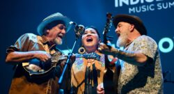 Three performers singing at the International Indigenous Music Summit