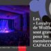 Une bannière grise – à gauche, une photo d'un groupe de musique sur scène, baigné de lumière bleue et violette. À droite, le texte : « Les Loyalty Labs de Wolfbrown sont gratuits pour les membres de CAPACOA. »